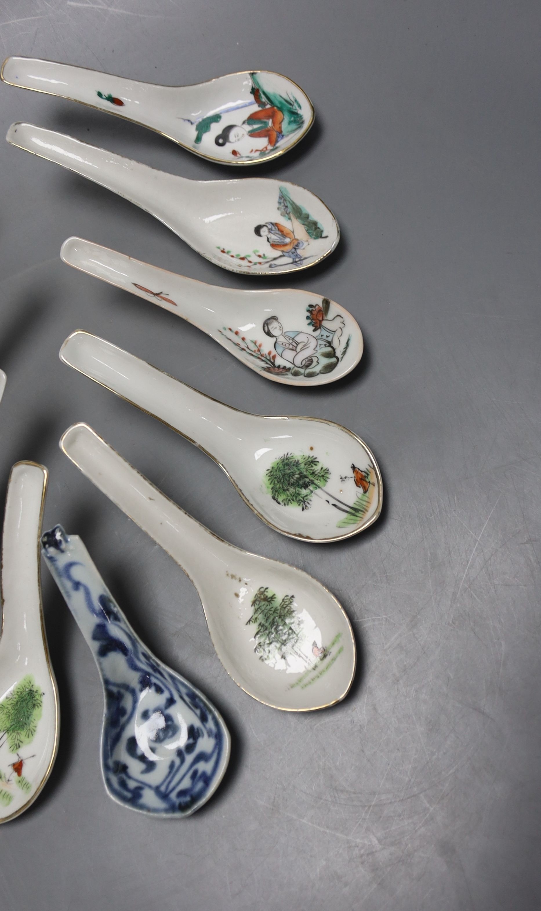 Eleven Chinese porcelain rice spoons, largest 15 cms long.